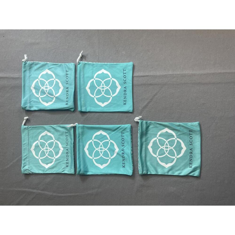 Kendra Scott set of 5 teal and white dust jewelry pouches